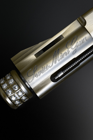 Illustration for article titled World's Smallest Gun Now In Gold and Diamonds, Kills Just the Same